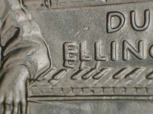 Close-up of 2009-D DC quarter DDR FS-801 showing doubled ELLINGTON letters